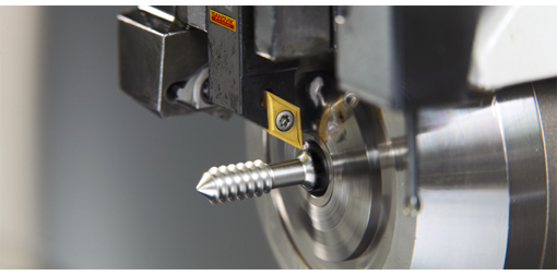 Sliding-head machines for machining medical components